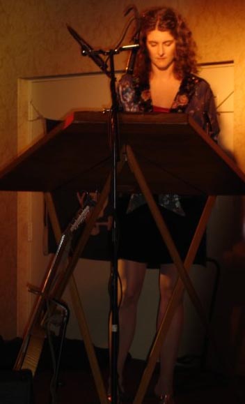 Darcy onstage. Photo by Toni Carringer.